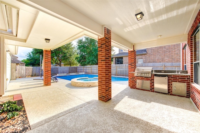 27107 Downing Park Blvd, Katy, TX 77494 - fenced backyard with a patio, a sink, and a pool with connected hot tub