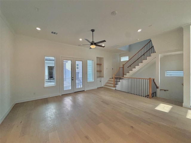 923 Fisher St Unit B, Houston, TX 77018 - unfurnished living room with a ceiling fan, plenty of natural light, light wood finished floors, recessed lighting, and stairs