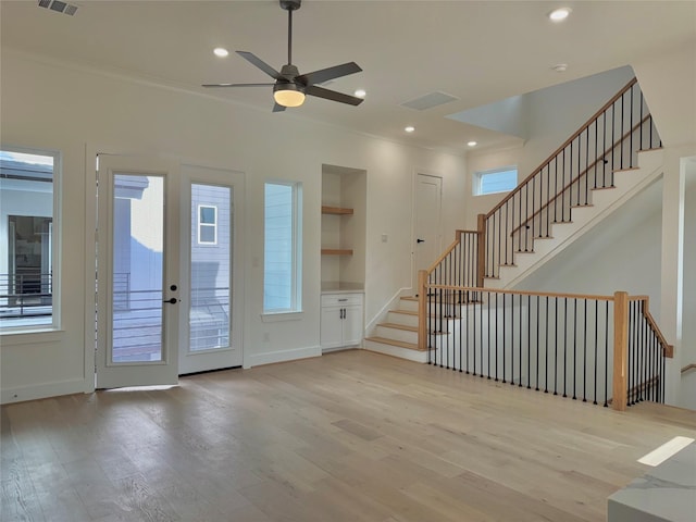 923 Fisher St Unit B, Houston, TX 77018 - entryway with wood finished floors, ornamental molding, a ceiling fan, recessed lighting, and stairs