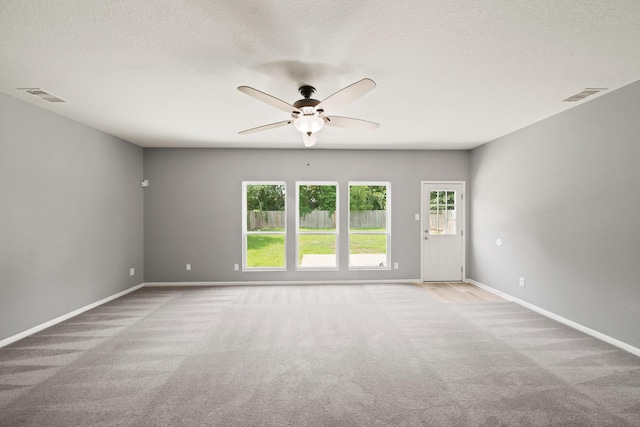 12414 Village Of Kings Lake Blvd, Houston, TX 77044 - unfurnished room with ceiling fan, carpet, and baseboards