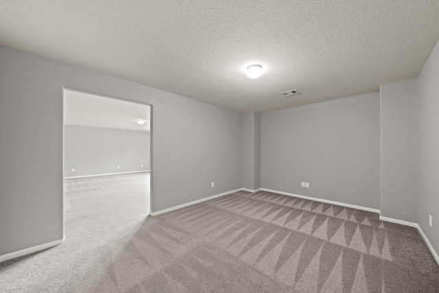 12414 Village Of Kings Lake Blvd, Houston, TX 77044 - spare room with carpet, baseboards, and a textured ceiling
