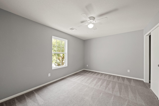 12414 Village Of Kings Lake Blvd, Houston, TX 77044 - carpeted empty room with a ceiling fan and baseboards