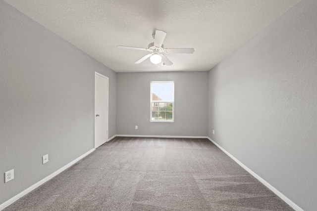 12414 Village Of Kings Lake Blvd, Houston, TX 77044 - carpeted spare room with a ceiling fan, baseboards, and a textured ceiling