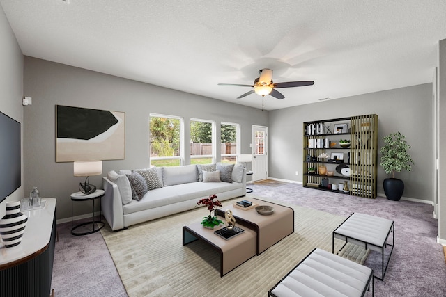 12414 Village Of Kings Lake Blvd, Houston, TX 77044 - living area with a ceiling fan and carpet floors