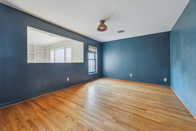 1984 Indiana St, Houston, TX 77019 - empty room with wood finished floors and baseboards
