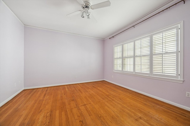1984 Indiana St, Houston, TX 77019 - unfurnished room with a ceiling fan, baseboards, light wood finished floors, and crown molding