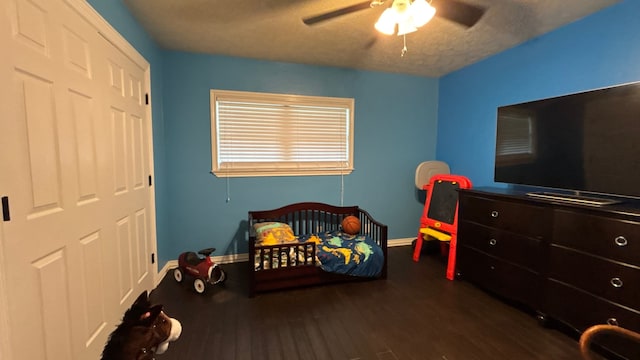 4400 Bethany St, Port Arthur, TX 77642 - bedroom with dark wood-style flooring, baseboards, and ceiling fan
