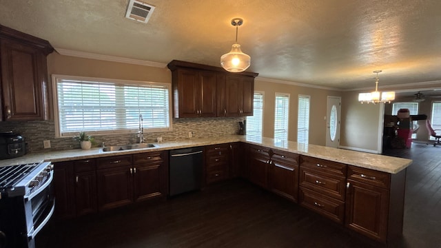 4400 Bethany St, Port Arthur, TX 77642 - kitchen with range with two ovens, a sink, dishwasher, dark wood finished floors, and a peninsula