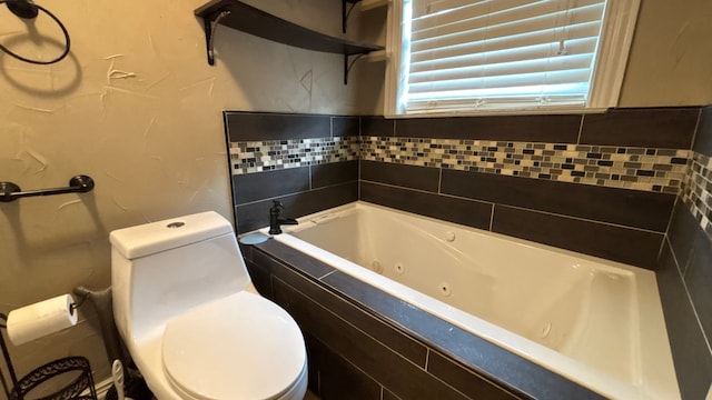4400 Bethany St, Port Arthur, TX 77642 - bathroom with a tub with jets and toilet