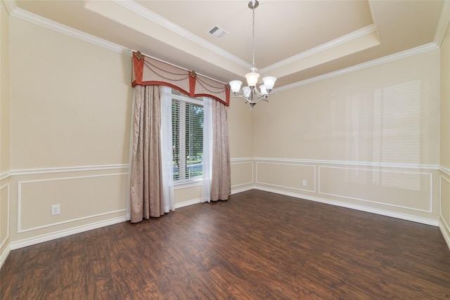 6230 Borg Breakpoint Dr, Spring, TX 77379 - empty room featuring a chandelier, wood finished floors, a raised ceiling, and ornamental molding