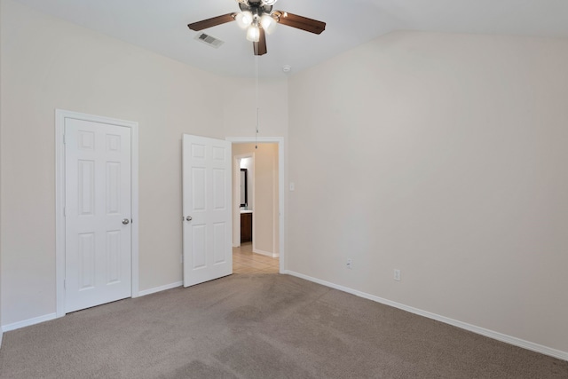 6806 Kotlan Ct, Magnolia, TX 77354 - unfurnished bedroom with light colored carpet, baseboards, a ceiling fan, and high vaulted ceiling