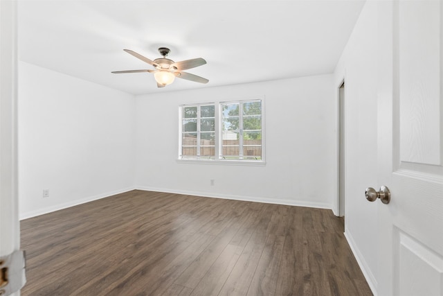 710 Vashti Dr, Houston, TX 77037 - spare room with dark wood-type flooring, a ceiling fan, and baseboards