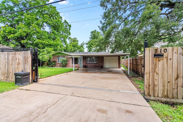 710 Vashti Dr, Houston, TX 77037 - view of front of home with brick siding, concrete driveway, and an attached garage