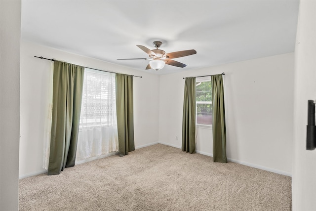 710 Vashti Dr, Houston, TX 77037 - spare room featuring carpet, ceiling fan, and baseboards