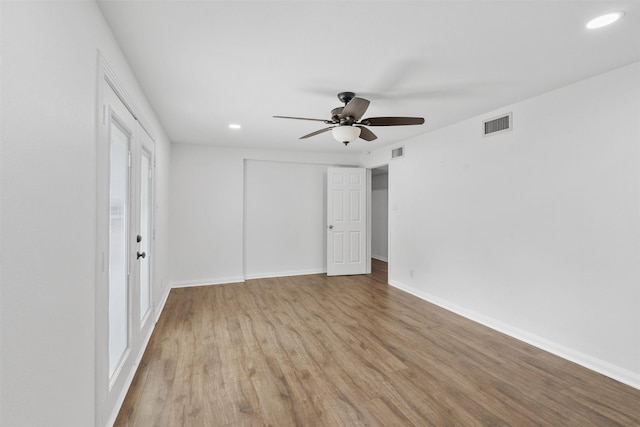 710 Vashti Dr, Houston, TX 77037 - unfurnished bedroom featuring wood finished floors, recessed lighting, a closet, baseboards, and a ceiling fan