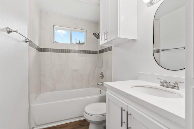 710 Vashti Dr, Houston, TX 77037 - full bathroom featuring vanity, toilet, bathtub / shower combination, and wood finished floors