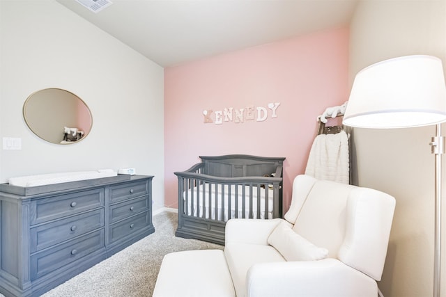 12314 Macbrice Ln, Humble, TX 77346 - carpeted bedroom featuring a crib and baseboards