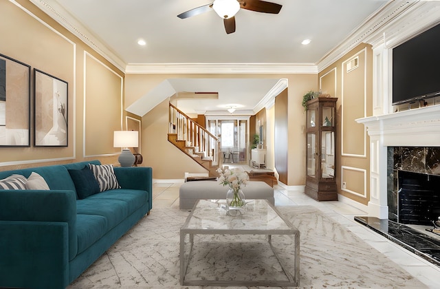 5802 Ashmere Ln, Spring, TX 77379 - living area featuring stairs, a ceiling fan, ornamental molding, a fireplace, and baseboards