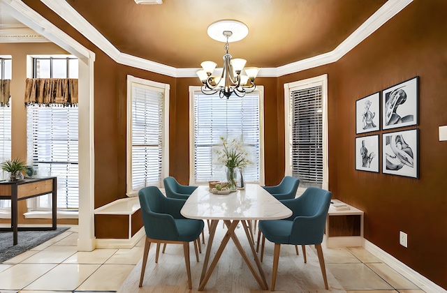 5802 Ashmere Ln, Spring, TX 77379 - dining area with a chandelier, ornamental molding, baseboards, healthy amount of natural light, and light tile patterned floors