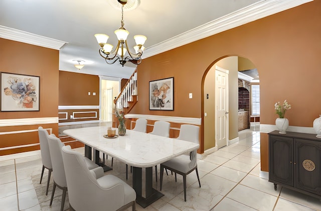 5802 Ashmere Ln, Spring, TX 77379 - dining space with arched walkways, crown molding, a chandelier, stairs, and light tile patterned floors