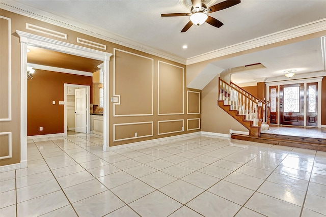 5802 Ashmere Ln, Spring, TX 77379 - unfurnished room featuring ornamental molding, stairway, a ceiling fan, light tile patterned floors, and baseboards