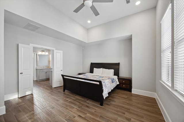 5405 Larkin St, Houston, TX 77007 - bedroom featuring wood finished floors, baseboards, a ceiling fan, recessed lighting, and ensuite bathroom
