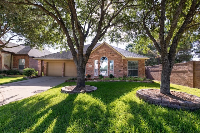 10906 Bernalda Cir, Richmond, TX 77406 - view of front of house featuring brick siding, driveway, a garage, and roof with shingles