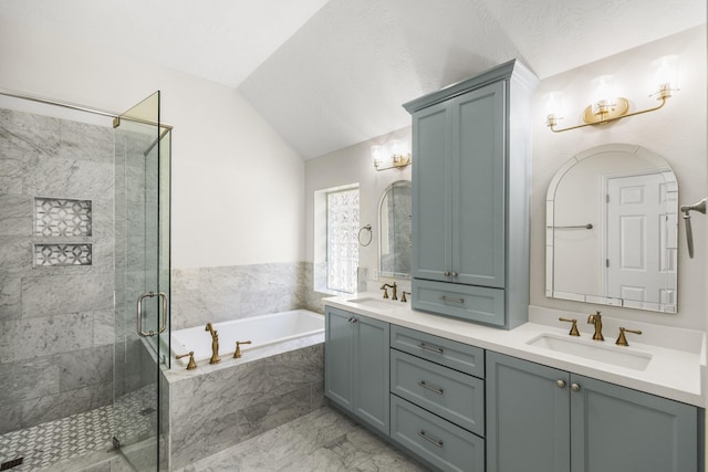 10906 Bernalda Cir, Richmond, TX 77406 - bathroom featuring a bath, vaulted ceiling, double vanity, a stall shower, and marble finish flooring