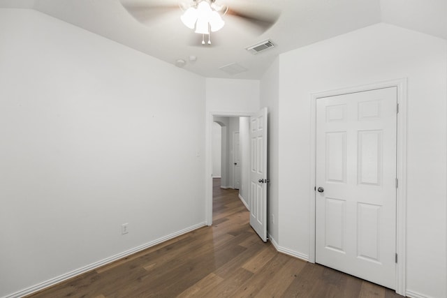 10906 Bernalda Cir, Richmond, TX 77406 - unfurnished bedroom with wood finished floors, vaulted ceiling, a ceiling fan, and baseboards