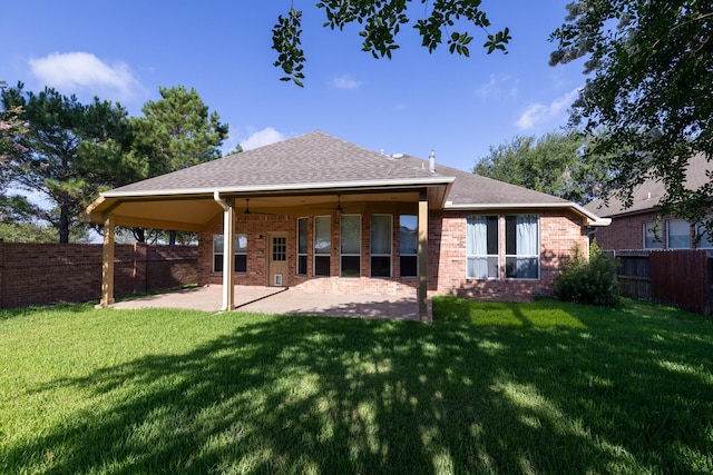 10906 Bernalda Cir, Richmond, TX 77406 - rear view of house with a patio, brick siding, and a shingled roof