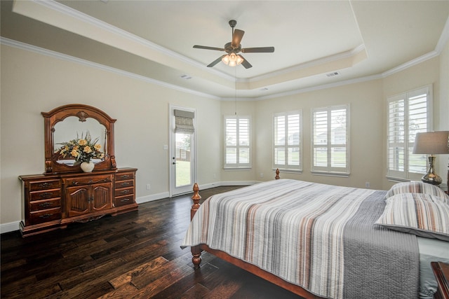 2515 Rainflower Meadow Ln, Katy, TX 77494 - bedroom featuring a tray ceiling, dark wood-style floors, crown molding, access to exterior, and baseboards