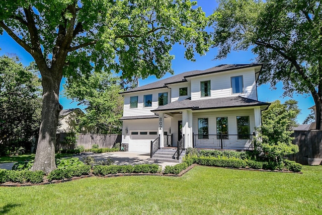 802 W 30th St, Houston, TX 77018 - view of front of home with a garage, driveway, and covered porch