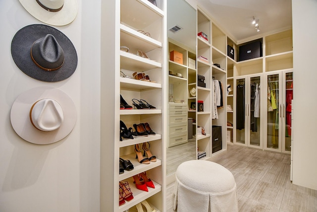 802 W 30th St, Houston, TX 77018 - walk in closet with light wood-style floors