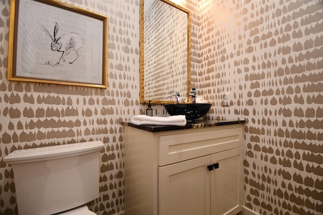 802 W 30th St, Houston, TX 77018 - half bathroom featuring wallpapered walls, vanity, and toilet