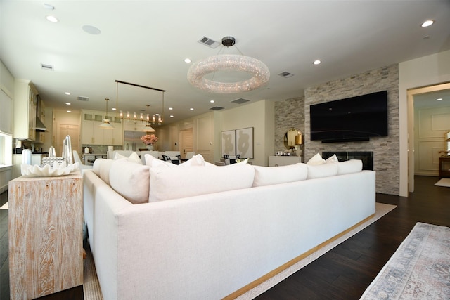 802 W 30th St, Houston, TX 77018 - living room with dark wood-style floors, a fireplace, and recessed lighting