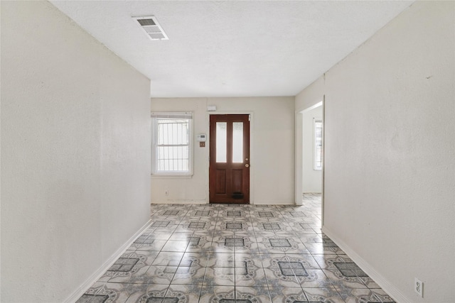 7547 Touchstone St, Houston, TX 77028 - entryway featuring baseboards