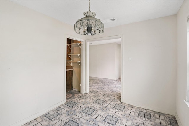 7547 Touchstone St, Houston, TX 77028 - empty room featuring a chandelier and baseboards