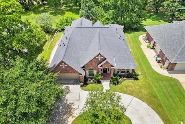512 Cherry Hills Dr, Huntsville, TX 77340 - view of subject property with a tree filled landscape