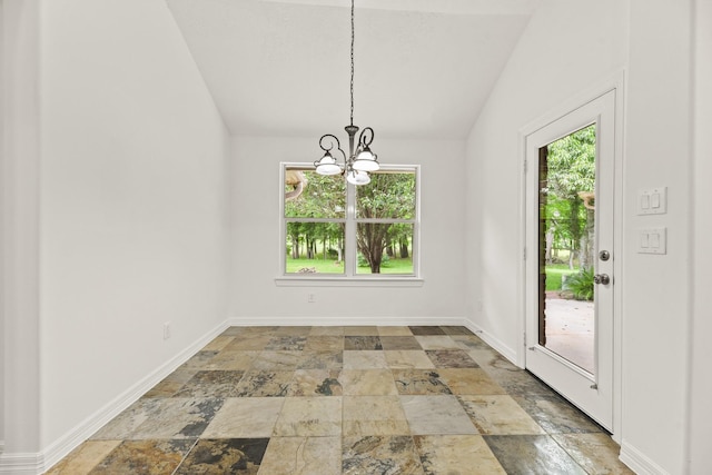 512 Cherry Hills Dr, Huntsville, TX 77340 - unfurnished dining area with stone tile floors, plenty of natural light, a chandelier, lofted ceiling, and baseboards