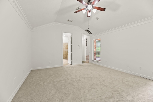 512 Cherry Hills Dr, Huntsville, TX 77340 - unfurnished bedroom featuring ornamental molding, light colored carpet, vaulted ceiling, baseboards, and ensuite bathroom
