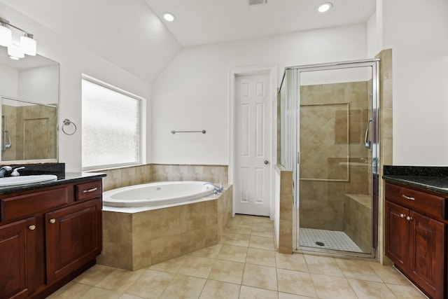 512 Cherry Hills Dr, Huntsville, TX 77340 - bathroom with vanity, a stall shower, a bath, tile patterned floors, and lofted ceiling