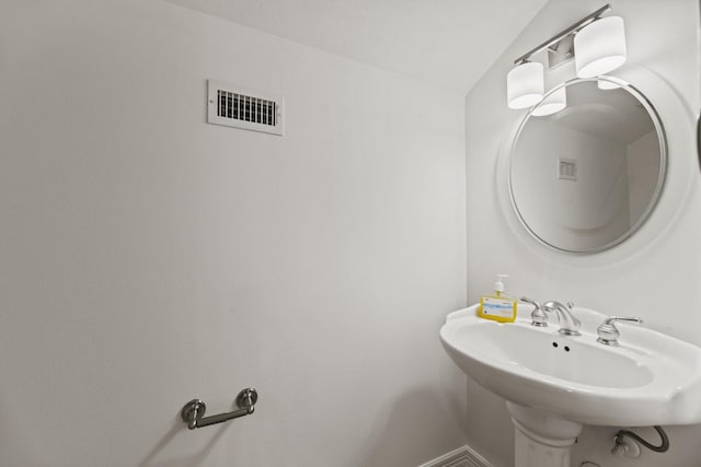512 Cherry Hills Dr, Huntsville, TX 77340 - bathroom with a sink and baseboards