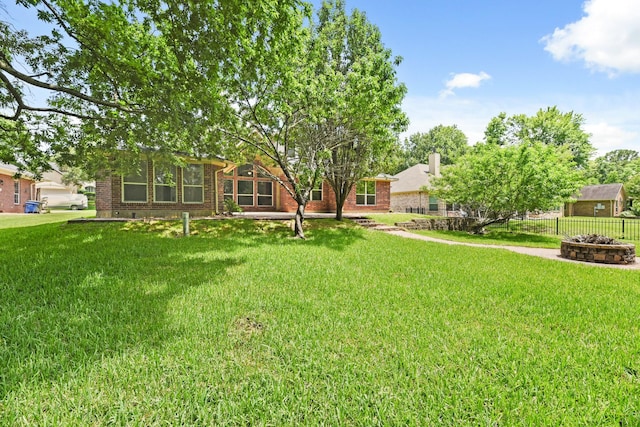 512 Cherry Hills Dr, Huntsville, TX 77340 - view of yard with an outdoor fire pit