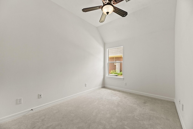 512 Cherry Hills Dr, Huntsville, TX 77340 - spare room featuring carpet flooring, ceiling fan, baseboards, and lofted ceiling