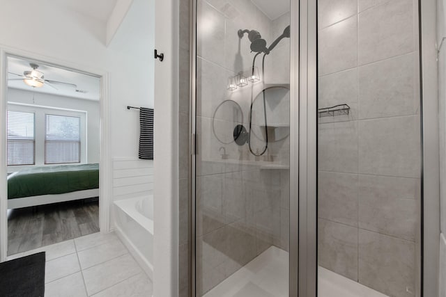 15511 Bosque Valley Ct, Cypress, TX 77433 - bathroom featuring a shower stall, a bath, ensuite bathroom, a ceiling fan, and tile patterned flooring