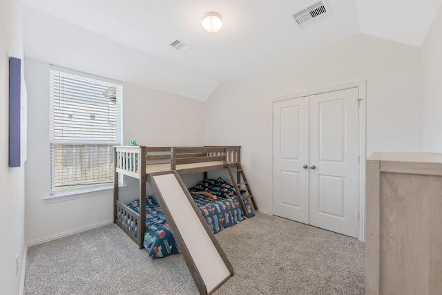 15511 Bosque Valley Ct, Cypress, TX 77433 - carpeted bedroom with vaulted ceiling, a closet, and baseboards