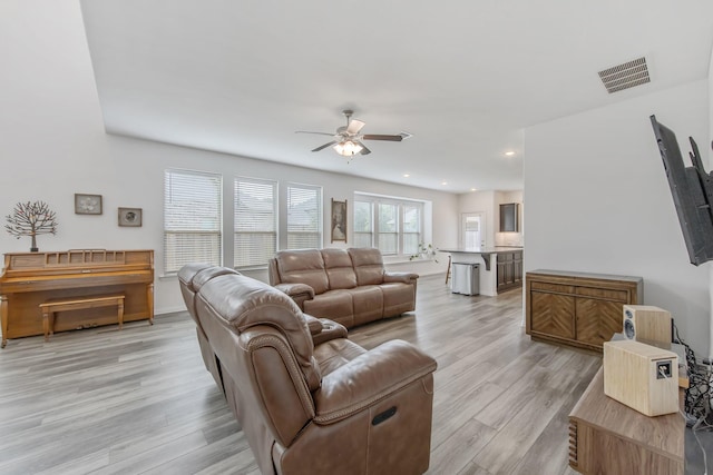 15511 Bosque Valley Ct, Cypress, TX 77433 - living room featuring a ceiling fan, light wood-type flooring, and recessed lighting