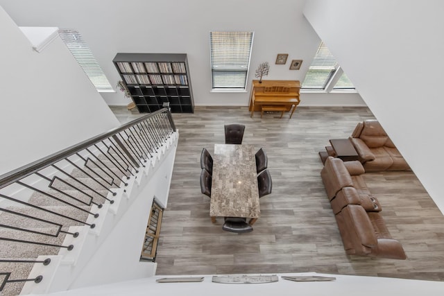 15511 Bosque Valley Ct, Cypress, TX 77433 - living area featuring wood finished floors and stairway
