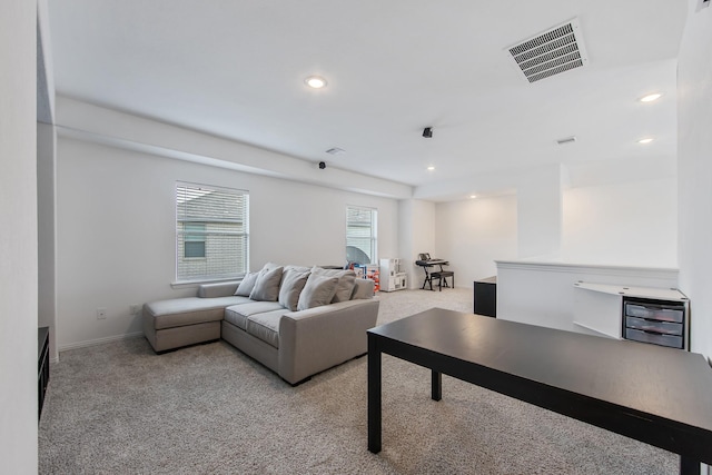 15511 Bosque Valley Ct, Cypress, TX 77433 - living area featuring light carpet, recessed lighting, wine cooler, and baseboards