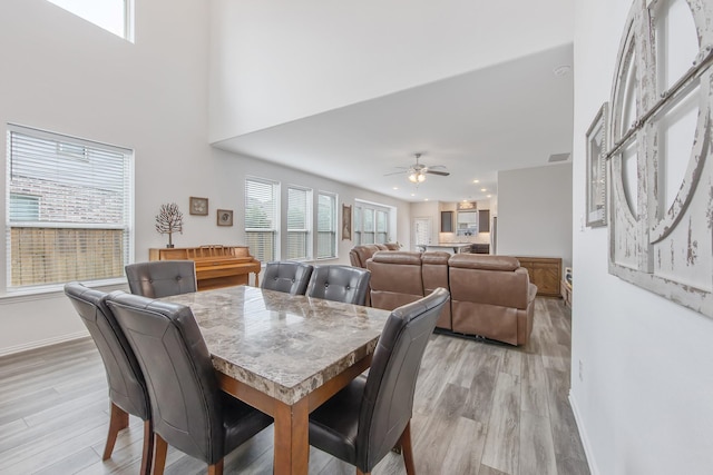 15511 Bosque Valley Ct, Cypress, TX 77433 - dining space with light wood-style floors, baseboards, a ceiling fan, and recessed lighting